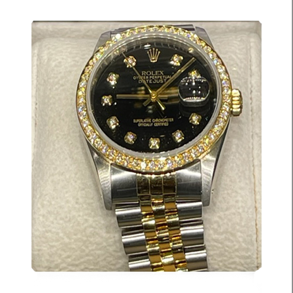 Rolex 26 mm gold face two tone with stainless steel. 18 KT YG With Diamond bezel(USED)